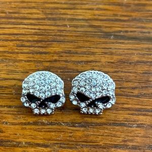 Harley Davidson skull earrings.